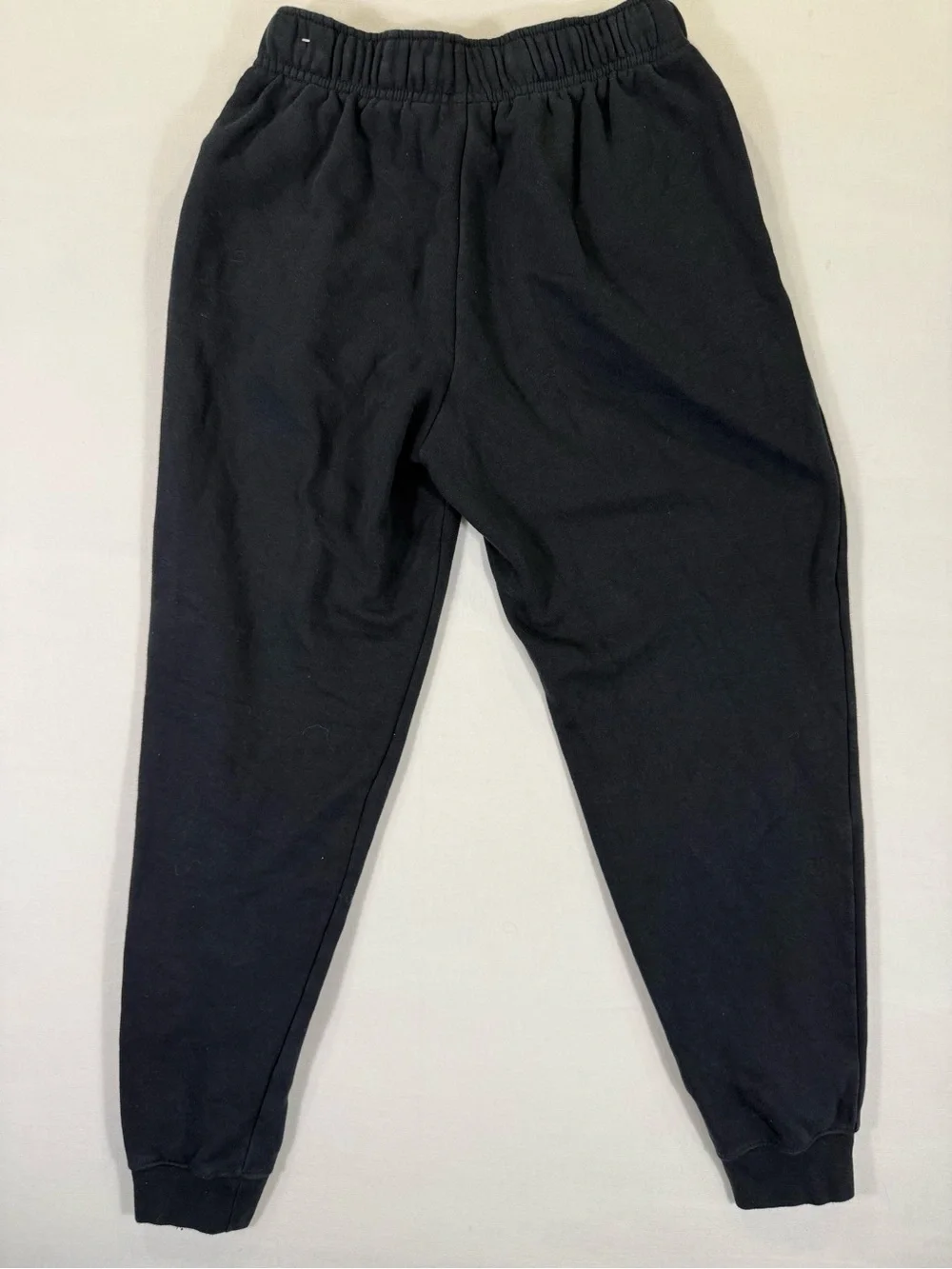 Nike Kids Black Jogger Sweatpants with White Swoosh
